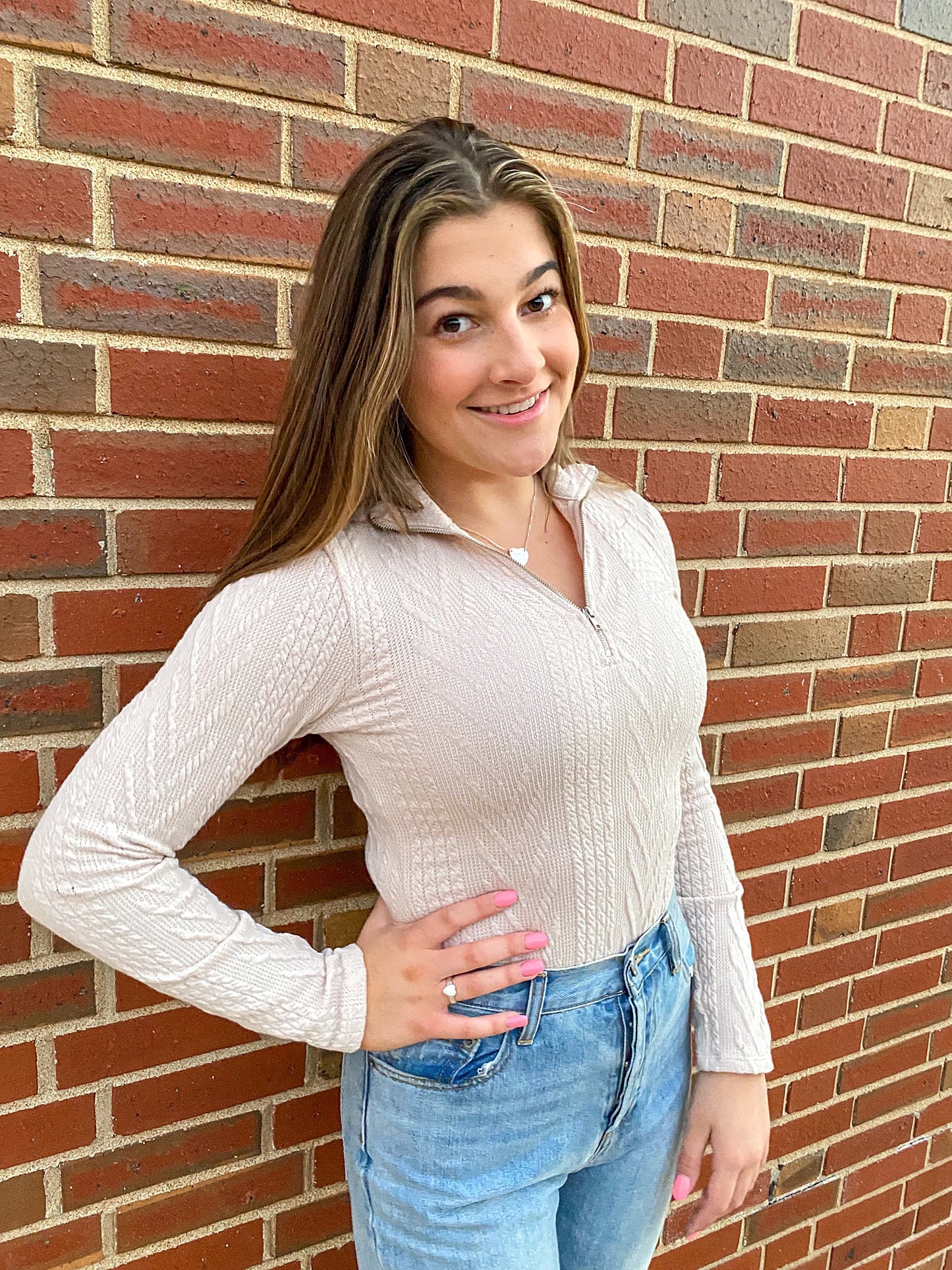 BLUSH ZIPPER BODYSUIT